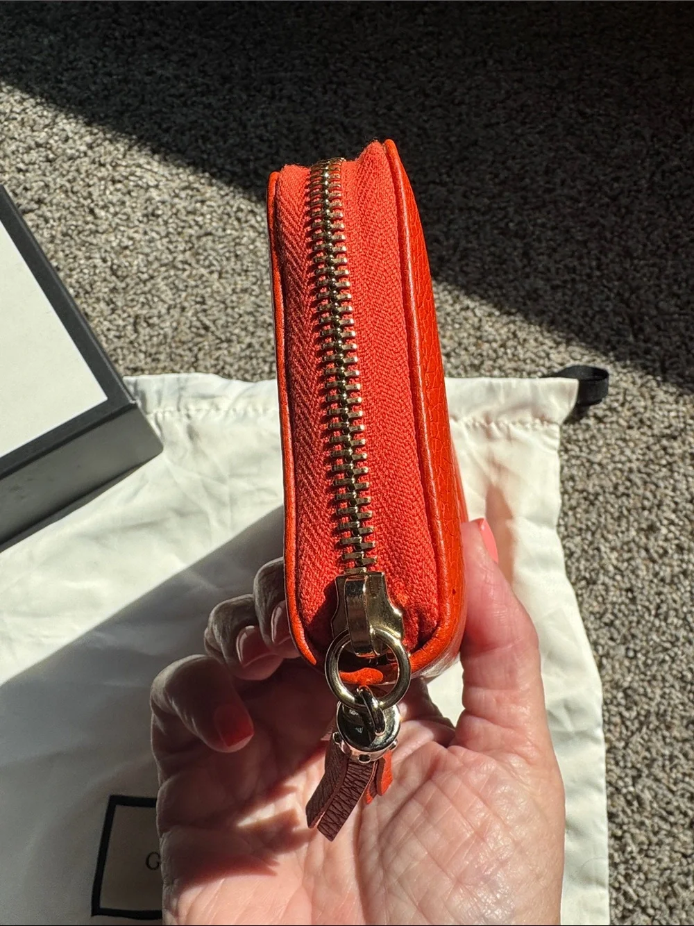 Gucci Orange Pebbled Leather Zip-Around Wallet With Tassle